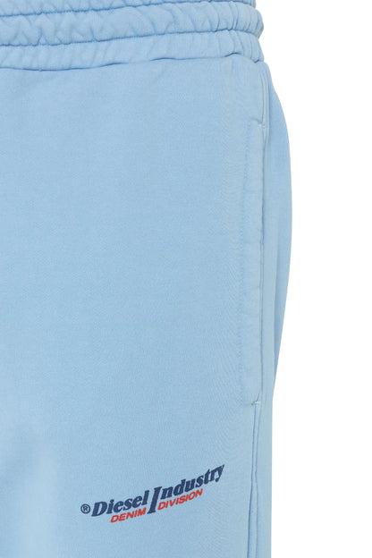 Light blue jogger pants close-up with elastic waistband and Diesel logo graphic