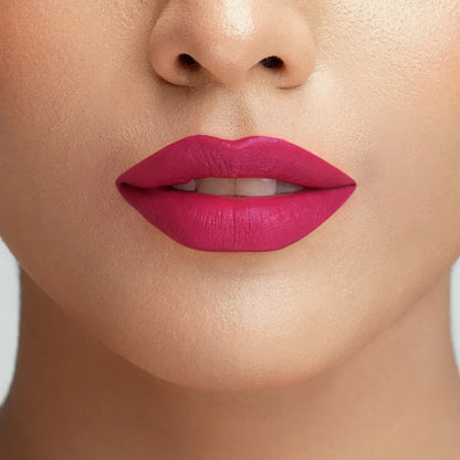 Magenta pink lipstick on model lips