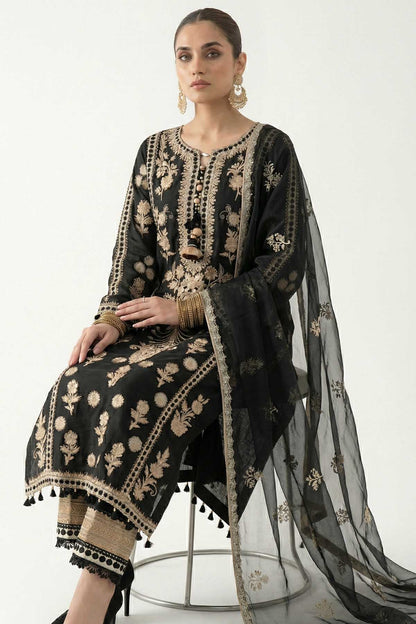 Black kurta with gold floral embroidery, matching pants, and sheer dupatta with motifs