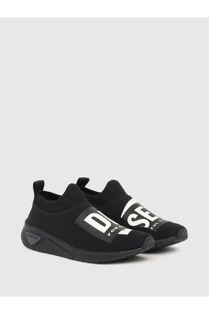 Black Diesel slip-on sneakers with white side logo and textured rubber sole tread