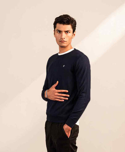 Navy fitted crewneck sweater with white rib trim and small chest logo, long sleeves