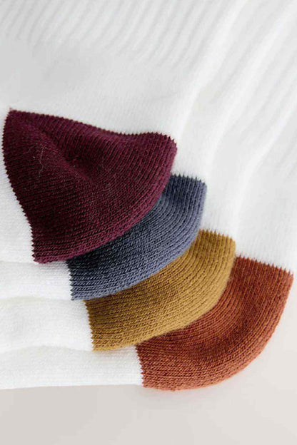 NEXT socks with contrast heels and toes in burgundy, blue, mustard, and brown