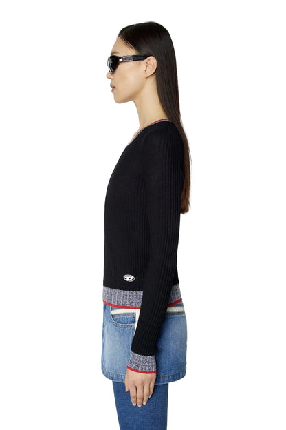 Black ribbed knit crewneck sweater with red/gray striped trim at collar and hem