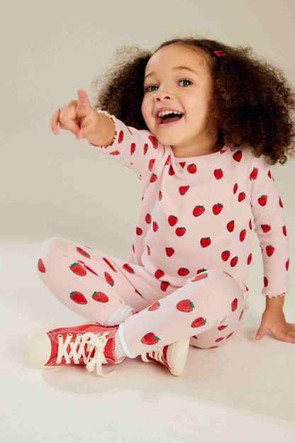 Kids' strawberry print pajama set with long sleeves and pants, all-over pattern