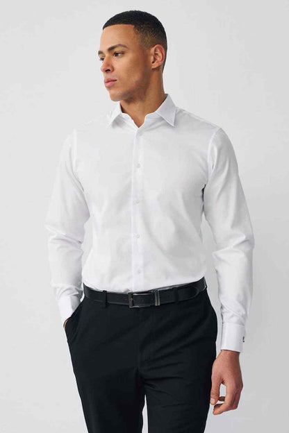White dress shirt with long sleeves, button-front, and pointed collar