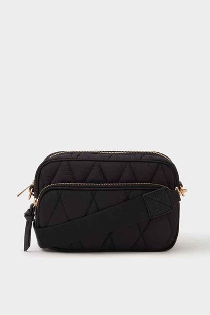 Black quilted crossbody bag with top zip, gold-tone hardware, adjustable strap