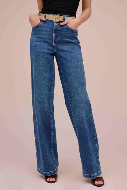 Dark blue denim jeans, high rise with belt loops and wide straight legs