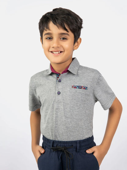 Kids heather gray polo shirt with maroon collar, embroidered chest logo, short sleeves
