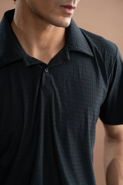 Men's dark textured polo shirt collar and button placket