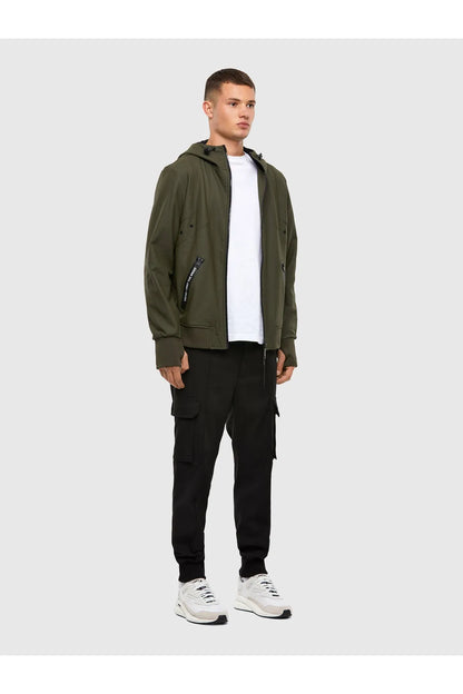 Diesel olive green hooded zip jacket worn over black cargo pants