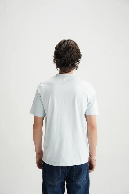 Back view of blue crew-neck T-shirt with short sleeves