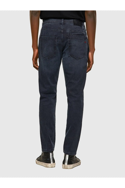 Dark blue denim jeans back view with rear pockets and waistband patch