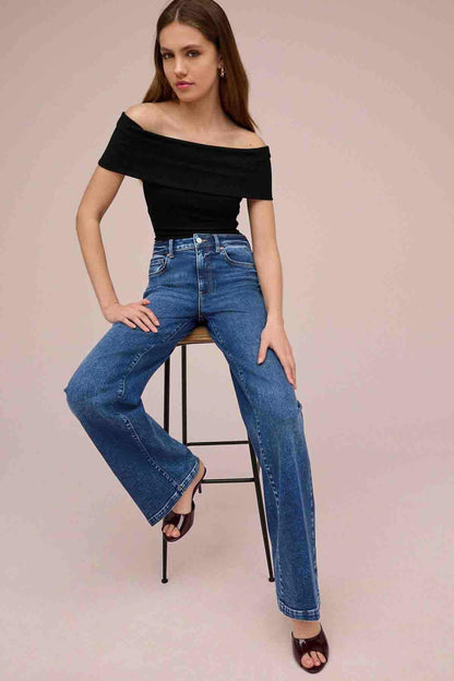 Dark blue wide-leg denim jeans, high rise, classic five-pocket style