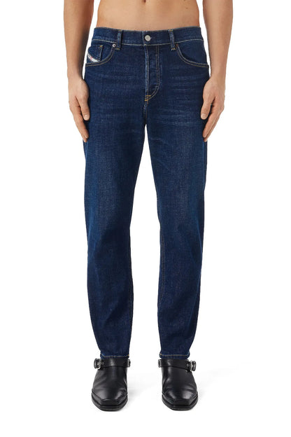Diesel blue denim jeans with straight legs, button closure, front pockets.