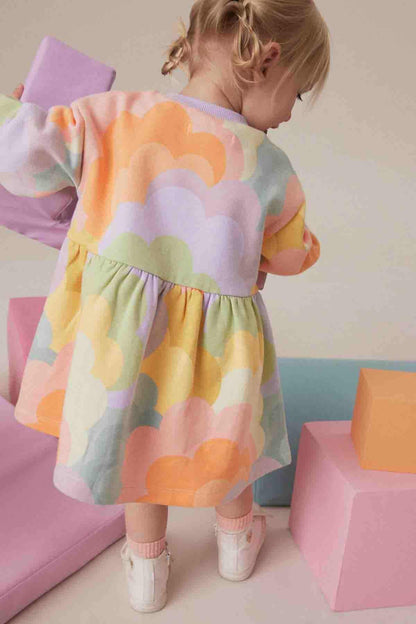 Children's long-sleeve cloud-print dress, back view with elastic waist