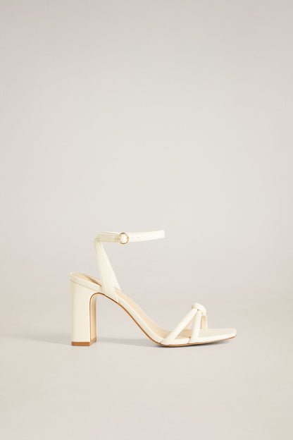 Ice grey heeled sandals with ankle strap, open toe, and block heel