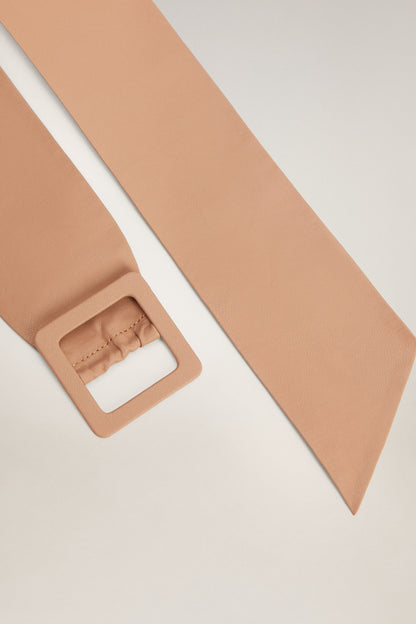 Beige belt with square cutout buckle and stitched strap end