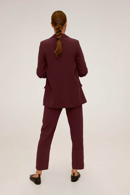 Maroon women's blazer and trousers, back view