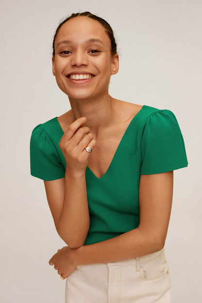 Green V-neck short-sleeve top with gathered puff sleeves