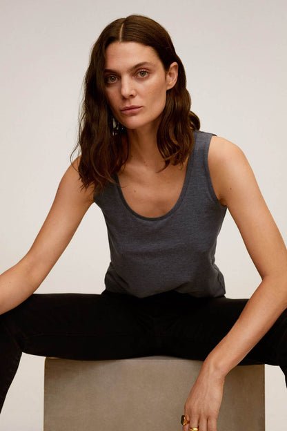 Women's medium heather grey sleeveless tank top with round neckline, close-up
