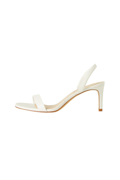 Off-white heeled sandal with open toe and cross-strap top, stiletto heel.
