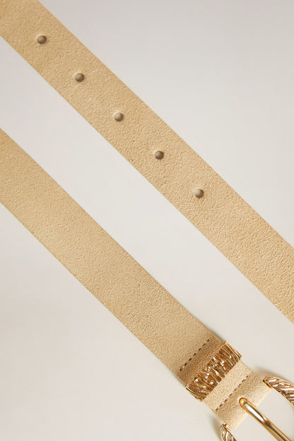 Beige belt strap with rows of eyelets and gold-tone buckle edge