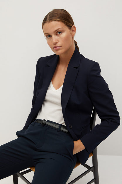 Women's dark navy blazer front view with notched lapel and tailored fit, long sleeves