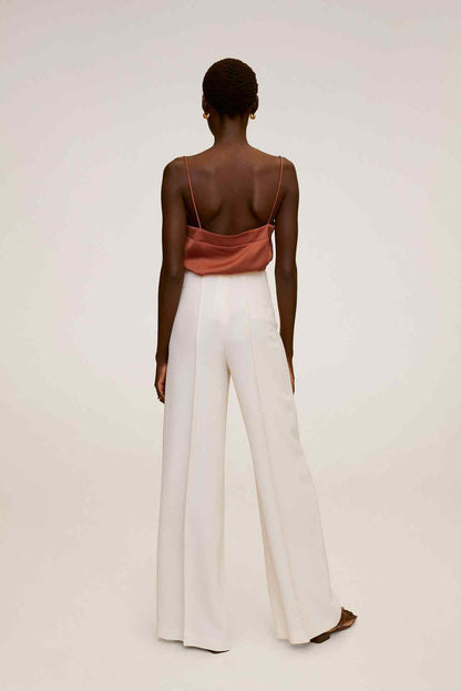 Burnt orange V-neck camisole top with spaghetti straps from the back