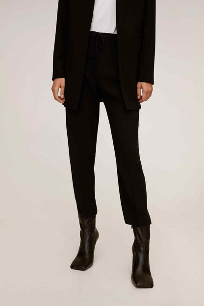 Black drawstring waist trousers with tapered ankle cuffs