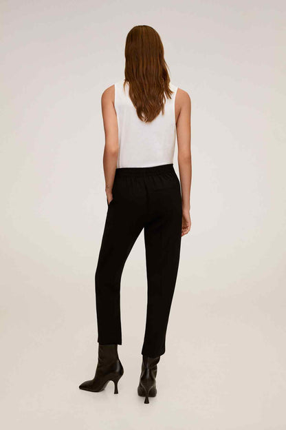 Back view black trousers with drawstring waist and tapered ankle hems