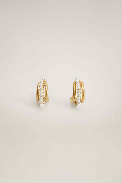 Gold hoop earrings with pearl bead detail, small hinged hoops
