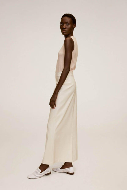 Beige sleeveless midi dress, side view with straight hem and sleeveless cut
