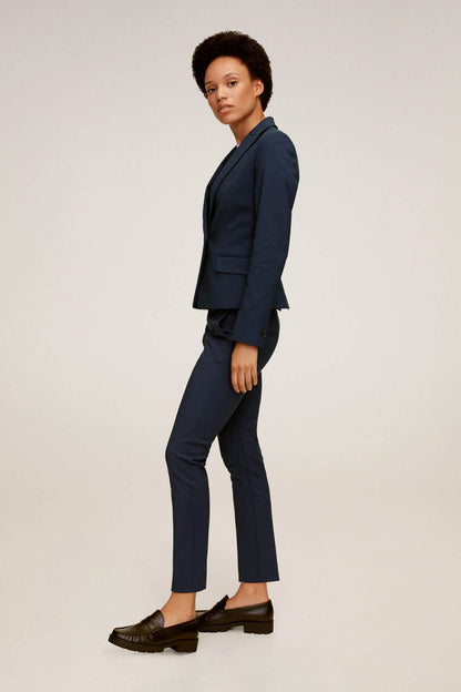 MANGO navy tailored trousers, side profile with tapered ankle-length leg