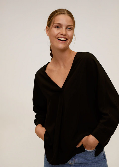 Black V-neck long-sleeve blouse with relaxed fit and draped fabric