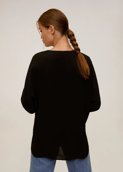 Black V-neck blouse, back view, relaxed fit with loose long sleeves