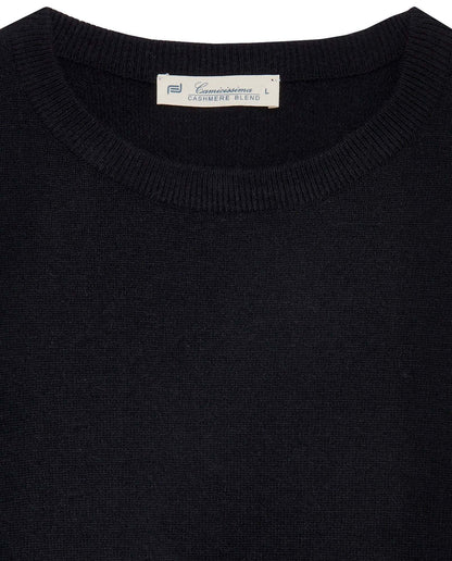 Black knit crewneck sweater close-up of ribbed collar and neckline