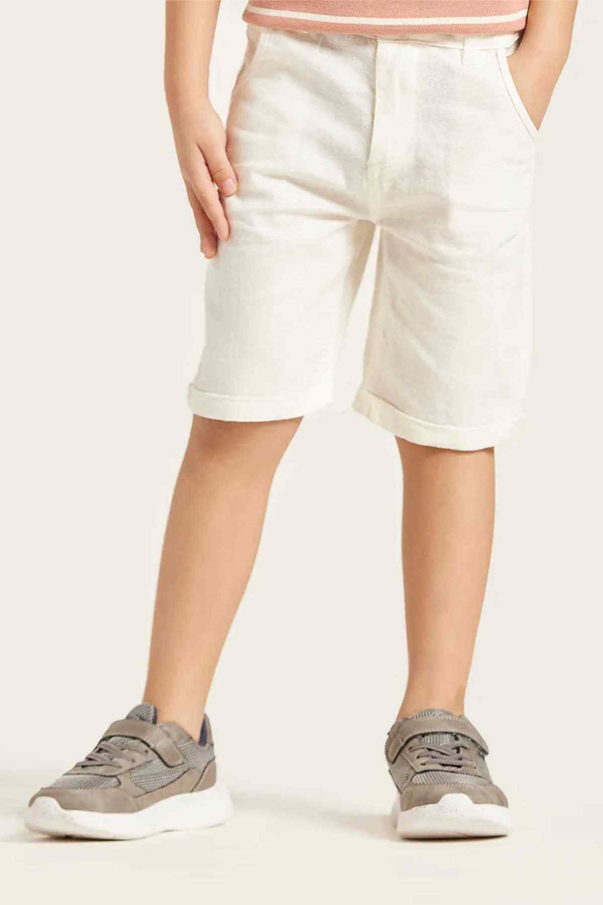 Children's white shorts with side seams and cuffed hem