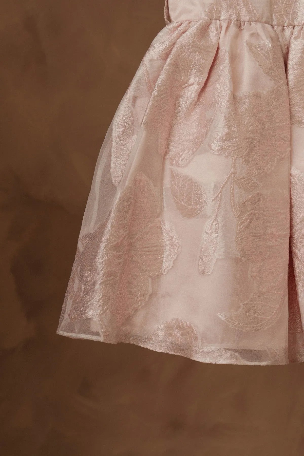 Light pink girls dress skirt with gathered waist and textured animal pattern