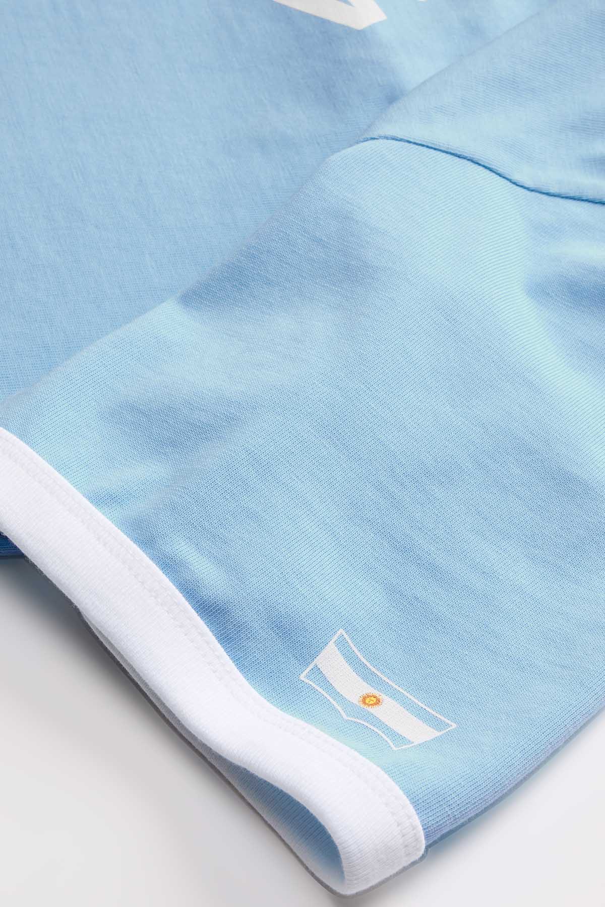 Sky blue T-shirt hem and cuff detail with white trim and small logo print