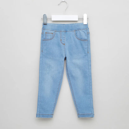 Light blue denim baby pants with elastic waistband and front pockets