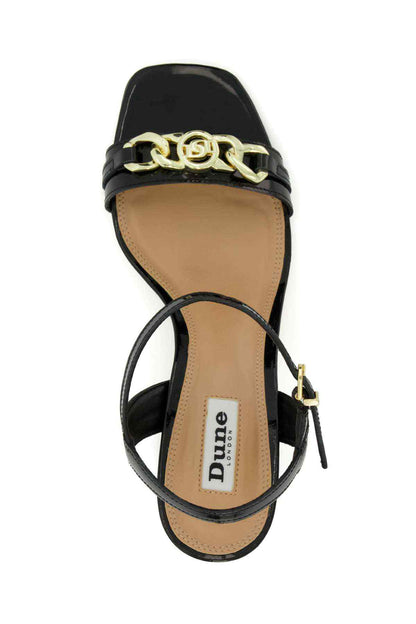 Dune London black heeled sandals with gold logo strap detail
