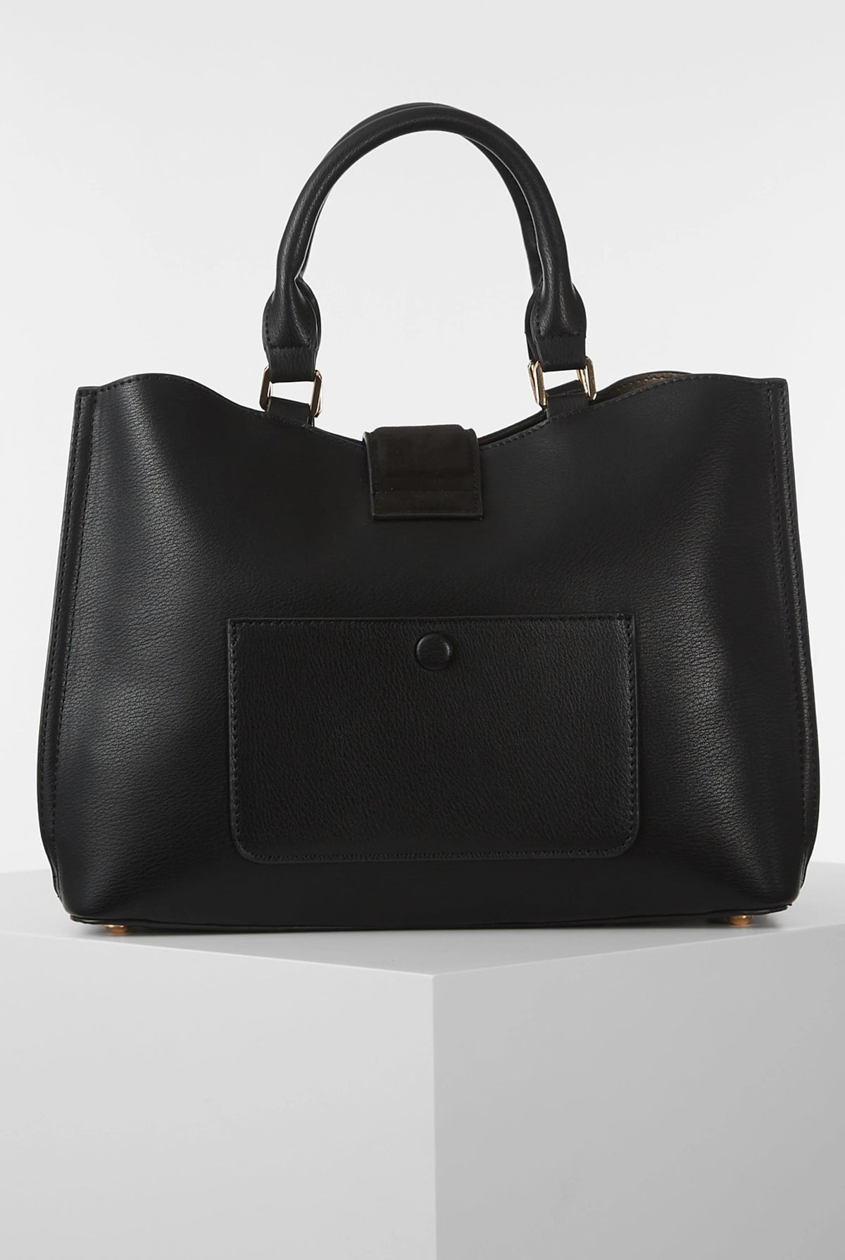 Black tote bag with top handles and front flap pocket with snap closure