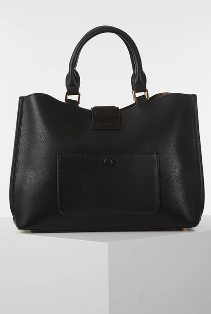Black tote bag with top handles and front flap pocket with snap closure