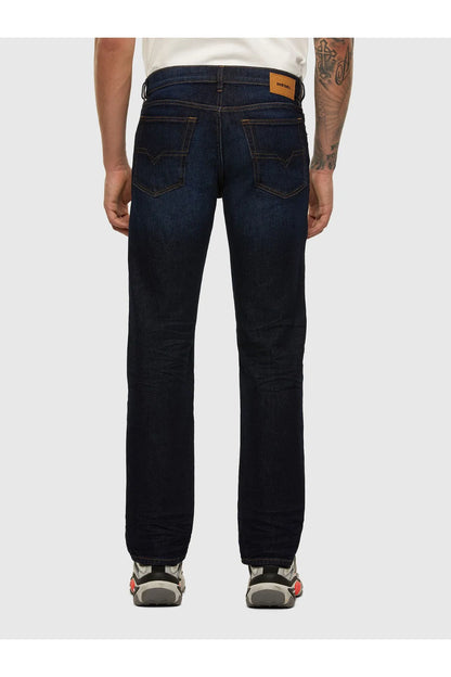 Diesel dark blue jeans back view with rear pockets and yoke stitching