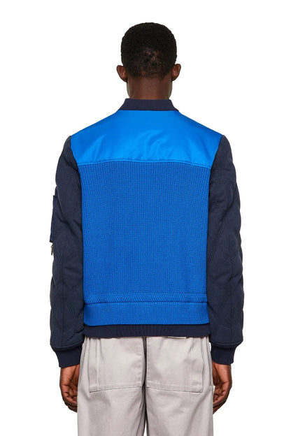 Diesel blue back panel bomber jacket with navy sleeves and ribbed hem cuffs