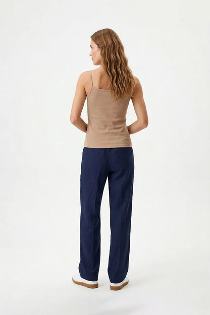 Skin-tan spaghetti-strap camisole back with scooped neckline