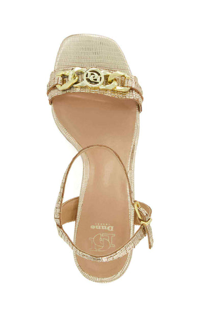Gold heeled sandal with ankle strap and gold logo buckle detail, flat sole