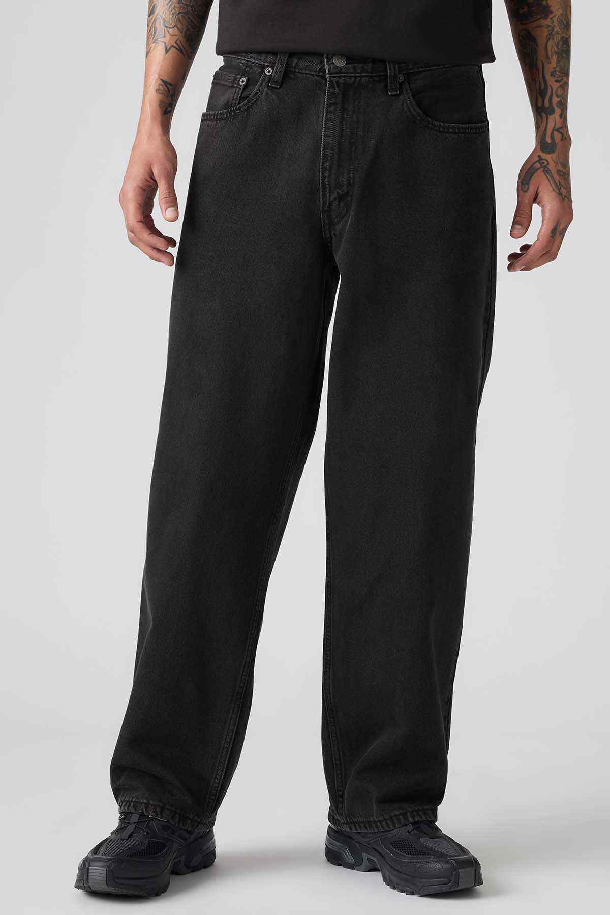 Black denim jeans with belt loops and five-pocket styling