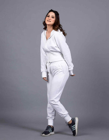 White jogger pants and V-neck long-sleeve sweatshirt set, cinched at waist