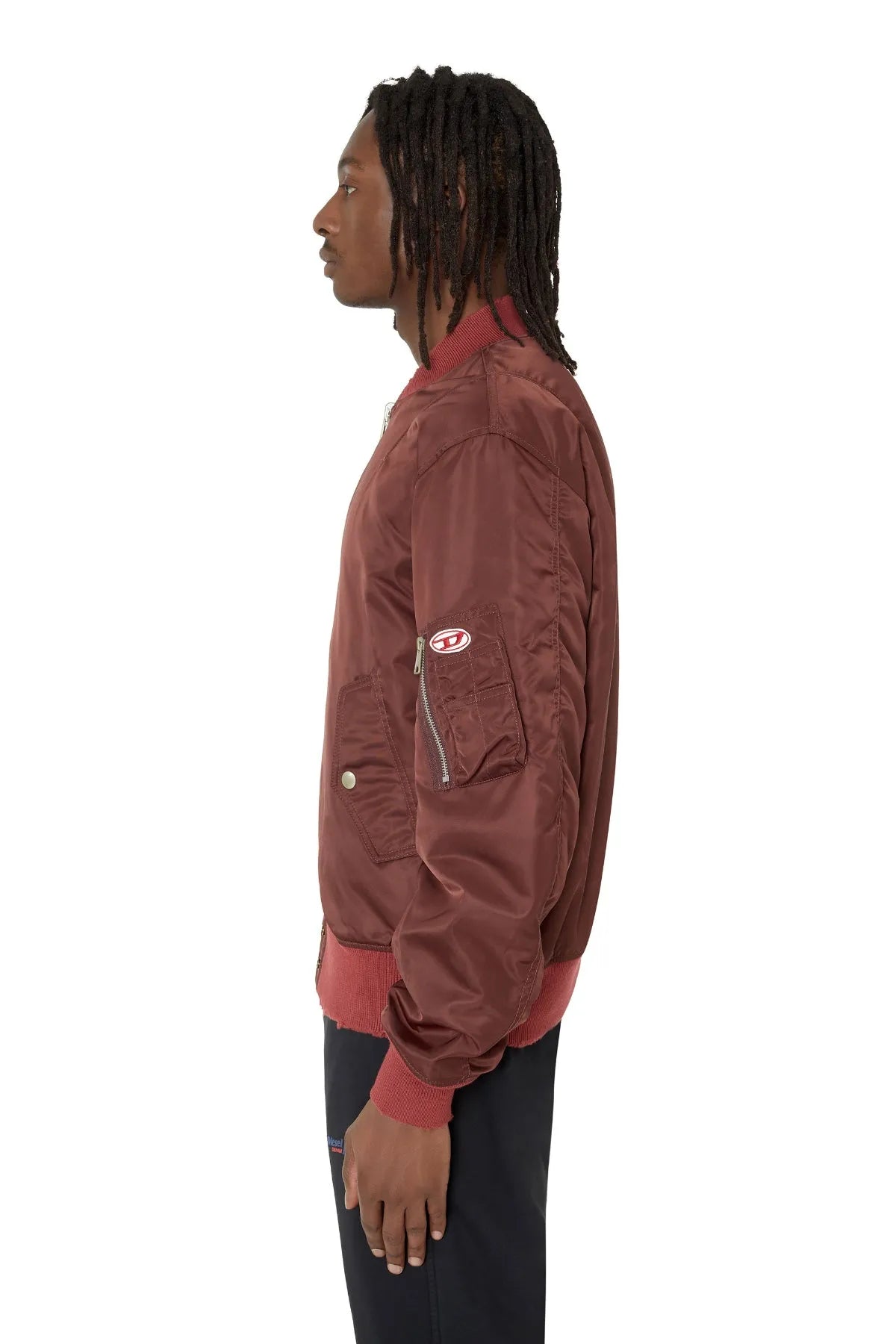 Brown satin bomber jacket side view with zipper, ribbed cuffs, and sleeve patch